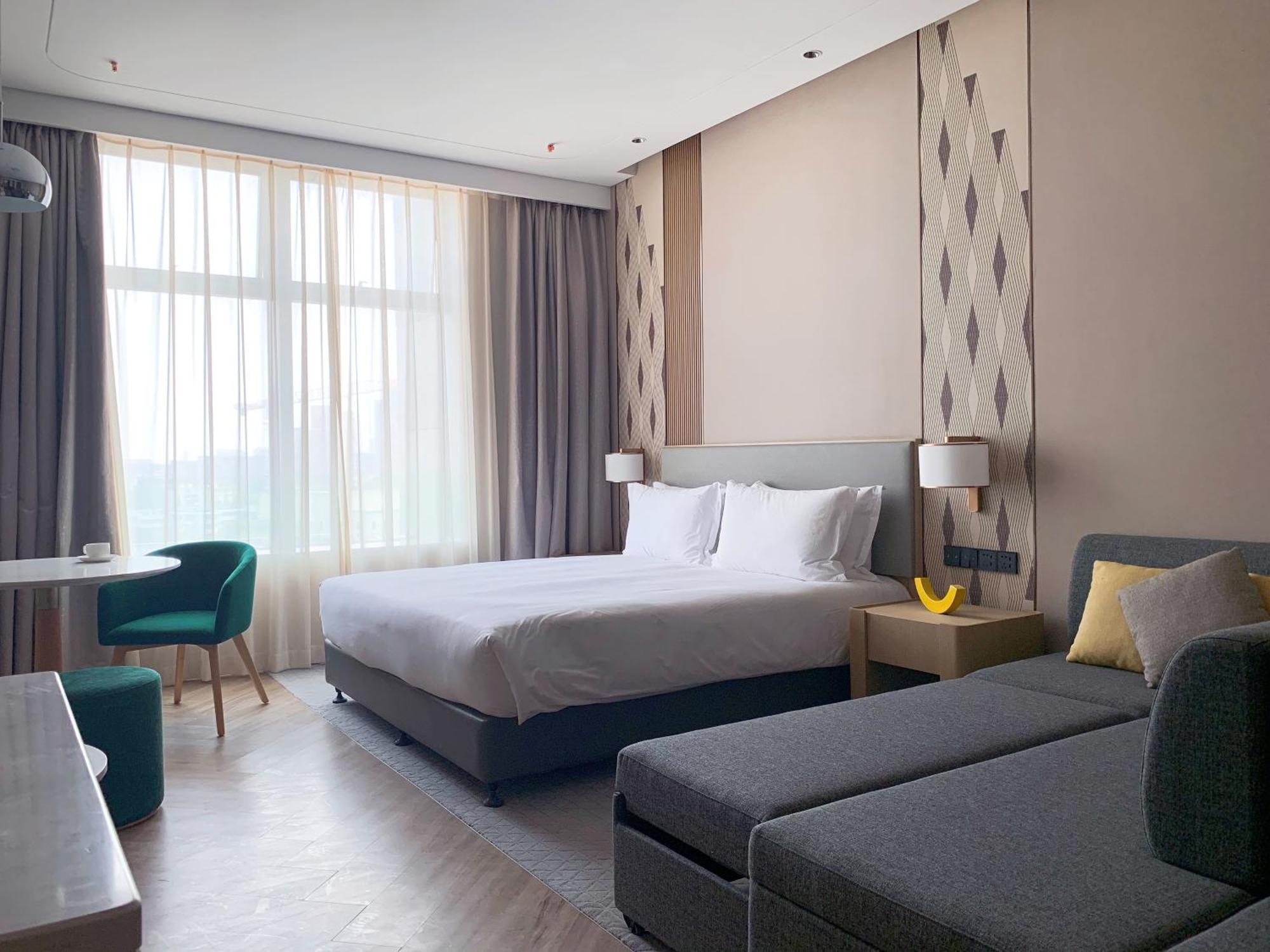 Holiday Inn Wuxi Central Station By Ihg Exterior foto